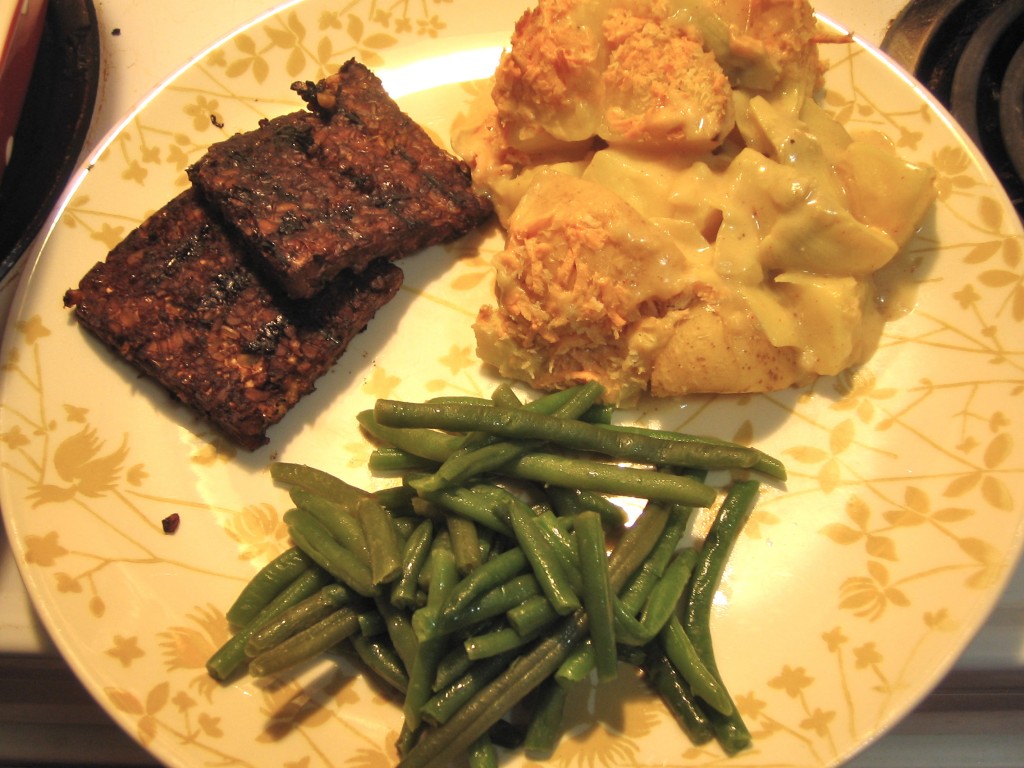 Tempeh, green beans and Artichoke Potato Gratin